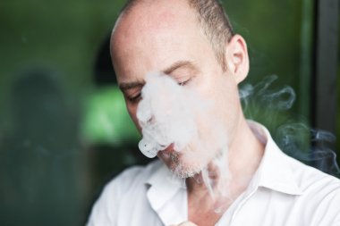 Portrait of smoking man