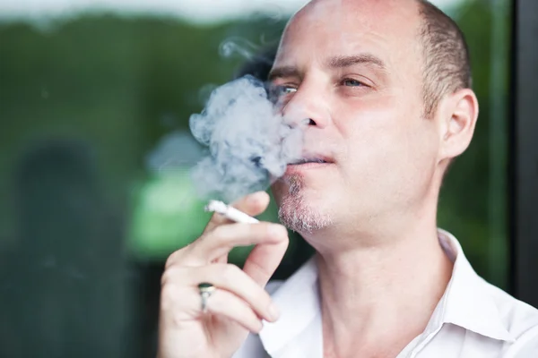 Portrait of smoking man