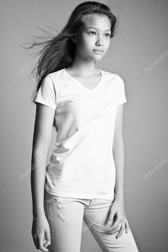 Teenager wearing jeans and t-shirt