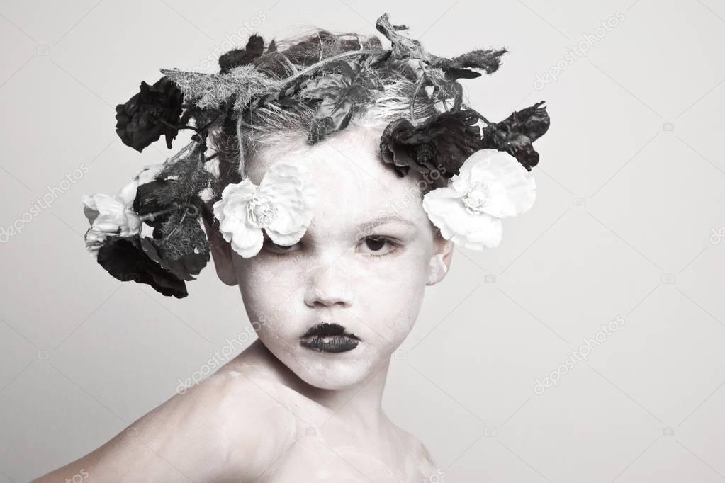 girl with flower wreath on head 