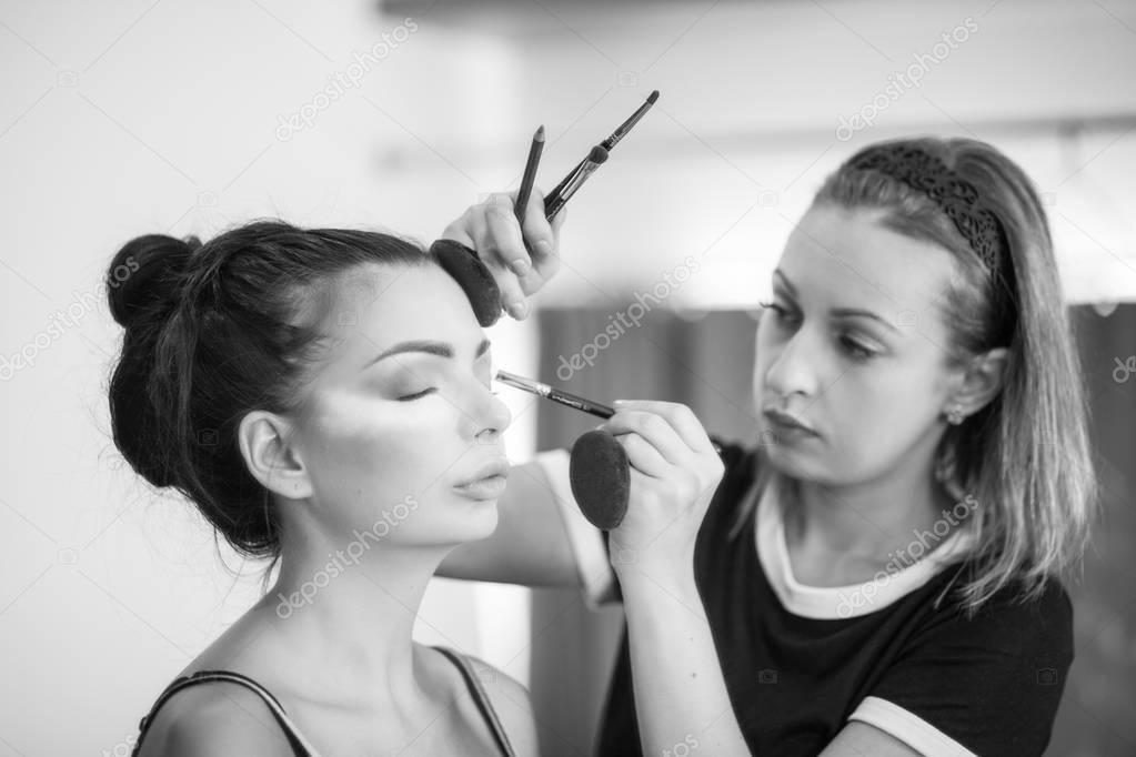 Make up artist with model