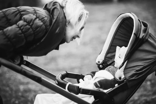 Mother Walking Son Baby Carriage Autumnal Street — Stock Photo, Image