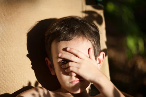 boy with obscured face