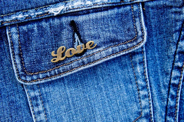Love on denim pocket background — Stock Photo, Image