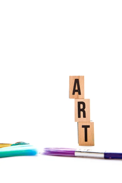 Art - blocks and brushes on white background — Stock Photo, Image