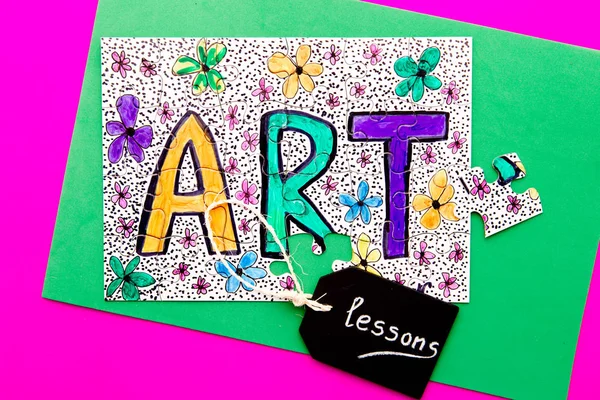 Art Jigsaw - hand drawn in colored pen on jigsaw puzzle with lessons written on chalkboard — Stock Photo, Image
