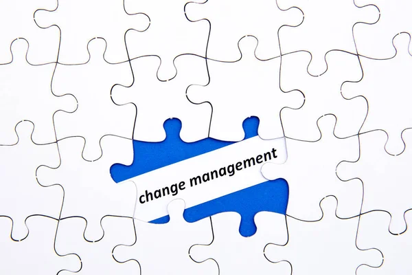 Puzzle Pieces - with words Change Management in missing blue space — Stock Photo, Image