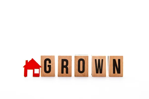 Home Grown - letras de bloque con el icono rojo de la casa / casa con fondo blanco —  Fotos de Stock