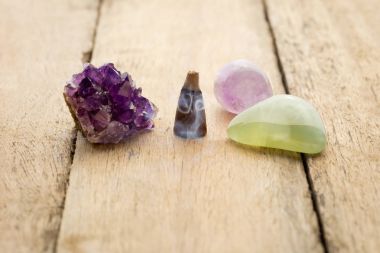 Burning incense cone with amethyst and pale green crystals with  clipart