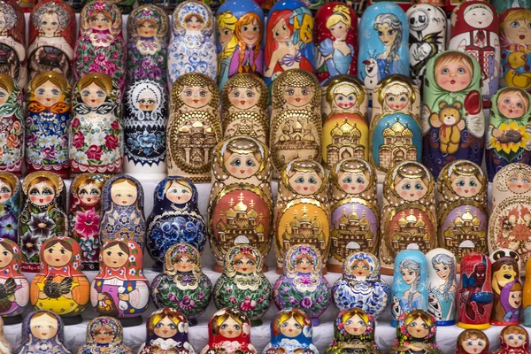 Beautiful colourful wooden dolls matryoshka at market. Matryoshka dolls is folks cultural symbol of Russia