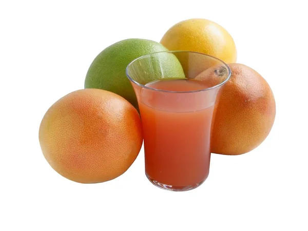 Zielony, żółty i pomarańczowy grejpfrutowy i sok — Zdjęcie stockowe