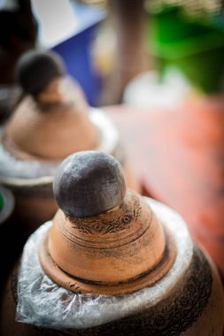 Dipper için toprak kavanozlu hindistan cevizi kabuğu tasarımı