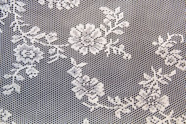 Beyaz dantel kumaş siyah deri ile