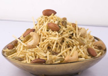 traditional indian panch ratan namkeen in bowl with dry fruits  clipart