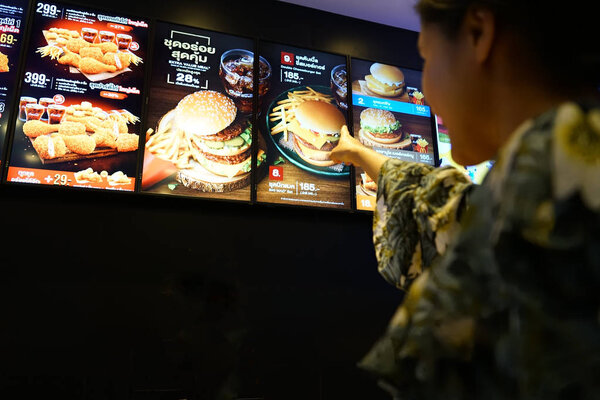 NAKHON PATHOM, THAILAND - FEB, 2018 :  the McDonald's burger set menu list on board