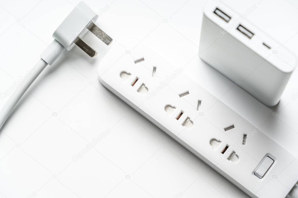 socket plug electric power bar and white silver power bank isolate. save energy and reduce energy efficiency concept