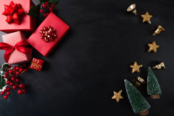 Merry Christmas, xmas present gift and decoration on black background — Stock Photo, Image