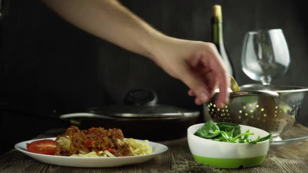 Pouring tomato sauce on pasta — Stock Video