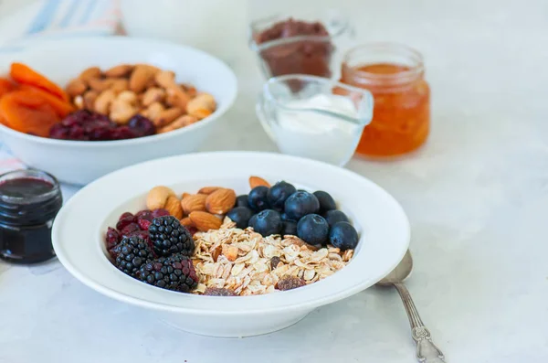 Healthy breakfast concept. Homemade granola (muesli) with blackb — Stock Photo, Image