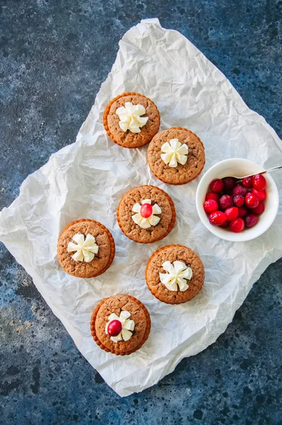 Brownie mins pies served on a baking paper on a blue stone backg — Stock Photo, Image