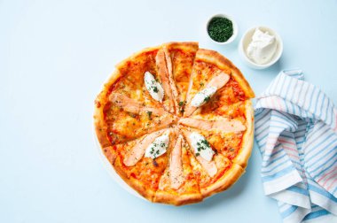 Pizza with fish and cream cheese - Plaisir.  clipart