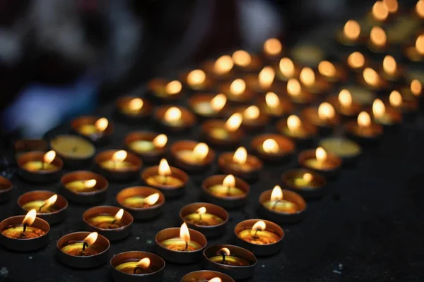 Candles and butter lamps for World Peace — Stock Photo, Image