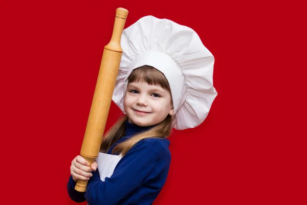 Menina Feliz Uniforme Chef Detém Rolo Pino Isolado Vermelho Chefe — Fotografia de Stock