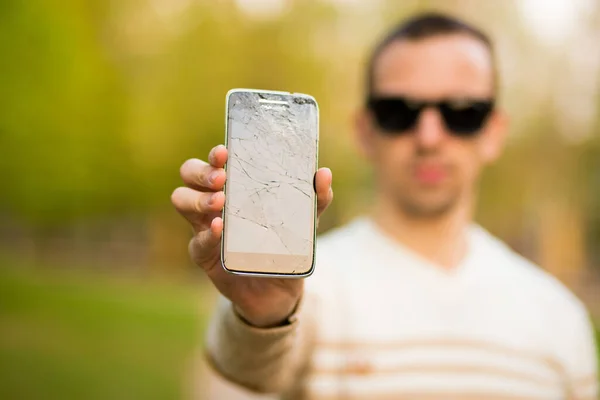 Guy Holding Black Smartphone Broken Display Broken Screen Modern Frameless — Stock Photo, Image