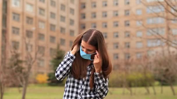 Portrait Young Student Woman Scared Eyes Wearing Protective Mask Outdoor — Stock Video