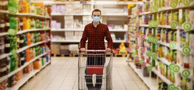 Man in protective mask shopping in supermarket pushing trolley during epidemic time. clipart