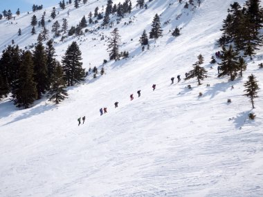 Climbers in the mountain with snow clipart