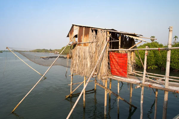 Bamboo shelter on the seashore — Stock Photo, Image