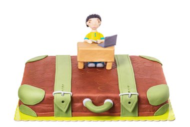 Cake a suitcase with a man from sugar paste. On birthday. clipart