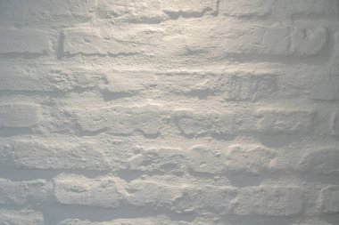 Arka plan, evin duvarı, taştan yapılmış tuğla. Arkaplan. Beyaz