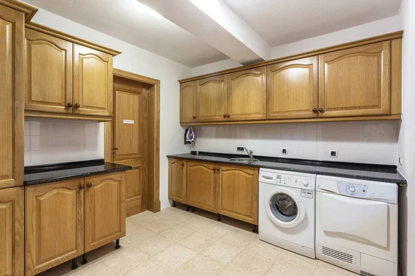 Empty kitchen without decoration or electrical appliances