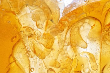 Sarı yağ, obezite hücreleri gibi, mikroskop altında, atomların ve moleküllerin kimyasal sürecidir. Yakın plan..