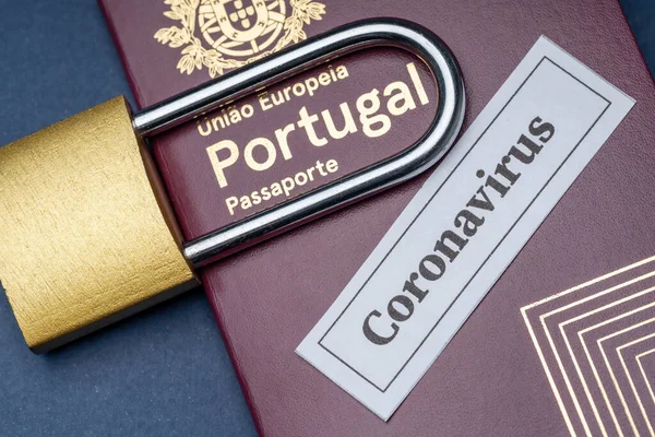 Portuguese european travel passport with padlock on blue background. Close-up. European Union — Stock Photo, Image