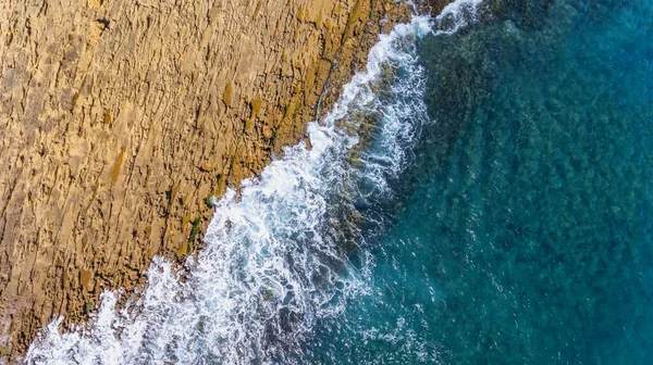 Aerial, landscape of waves of the Pacific Atlantic Ocean, which are washed by rocky shores. Portugal. — Stock Photo, Image