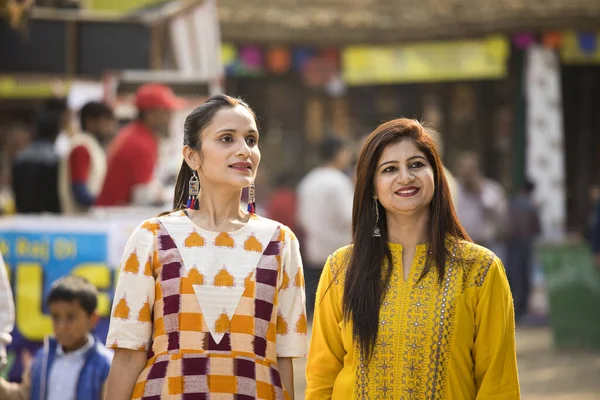 Two happy Indian women at street market — 스톡 사진