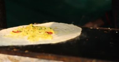 Cooking masala dosa at Surajkund Mela food stall
