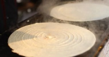 Cooking masala dosa at Surajkund Mela food stall