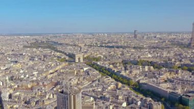 PARIS, FRANCE - MAY, 2019: Aerial drone view of Triumphal Arch and and Eiffel tower in historical city centre.