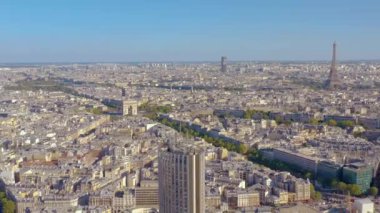 PARIS, FRANCE - MAY, 2019: Aerial drone view of Triumphal Arch and and Eiffel tower in historical city centre.