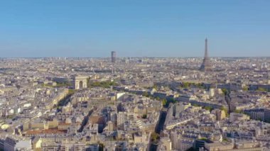 PARIS, FRANCE - MAY, 2019: Aerial drone view of Triumphal Arch and and Eiffel tower in historical city centre.