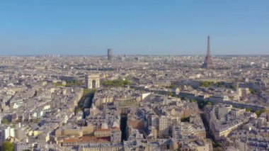 PARIS, FRANCE - MAY, 2019: Aerial drone view of Triumphal Arch and and Eiffel tower in historical city centre.