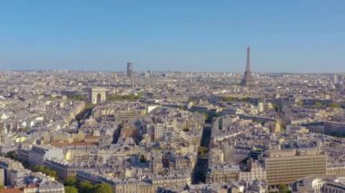 PARIS, FRANCE - MAY, 2019: Aerial drone view of Triumphal Arch and and Eiffel tower in historical city centre.