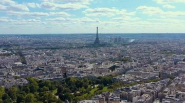 PARIS, FRANCE - MAY, 2019: Aerial drone view of Eiffel tower and historical city centre from above.