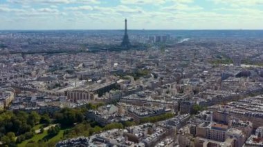 PARIS, FRANCE - MAY, 2019: Aerial drone view of Eiffel tower and historical city centre from above.