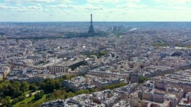 PARIS, FRANCE - MAY, 2019: Aerial drone view of Eiffel tower and historical city centre from above.