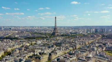 PARIS, FRANCE - MAY, 2019: Aerial drone view of Eiffel tower and historical city centre from above.